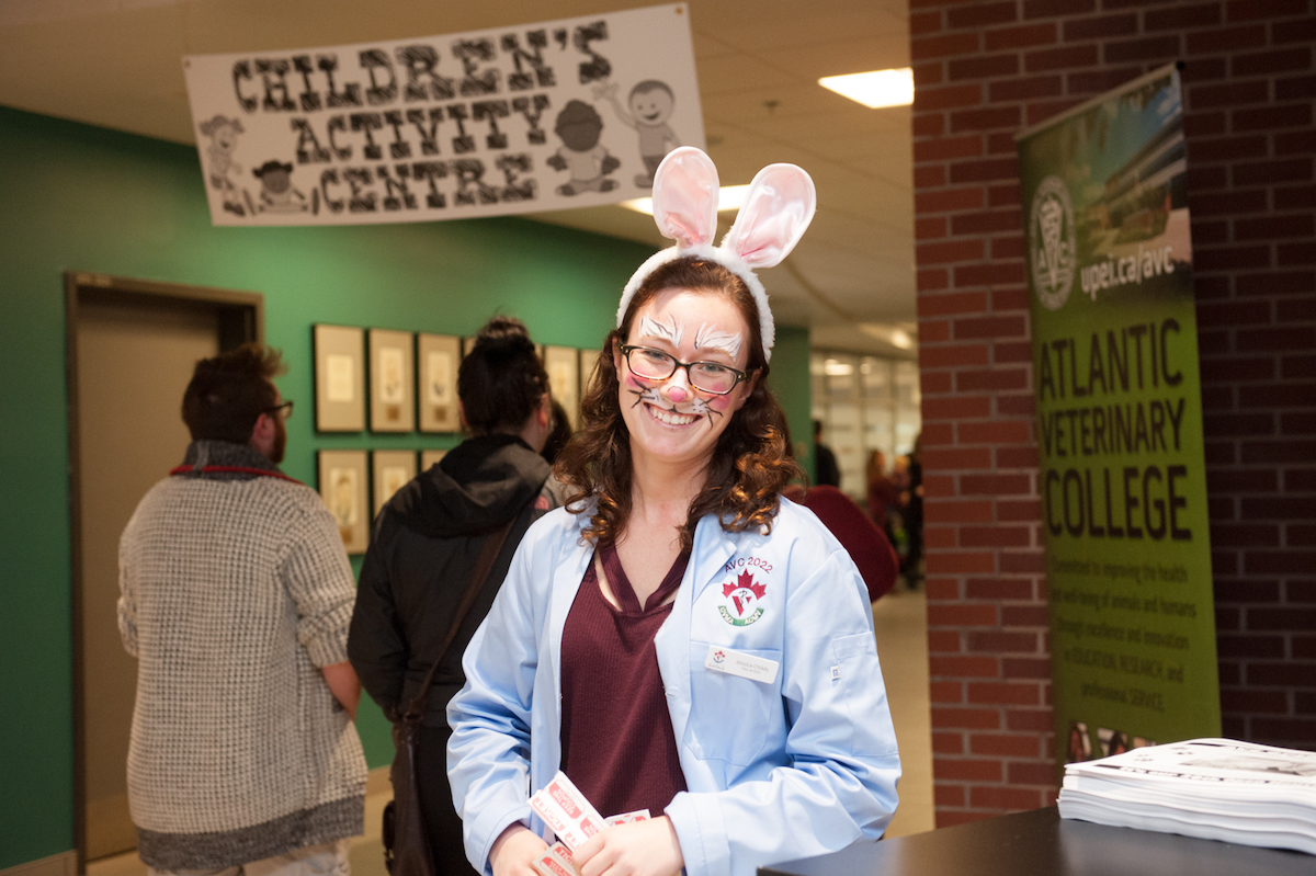 veterinary student with her face painted like a rabbit