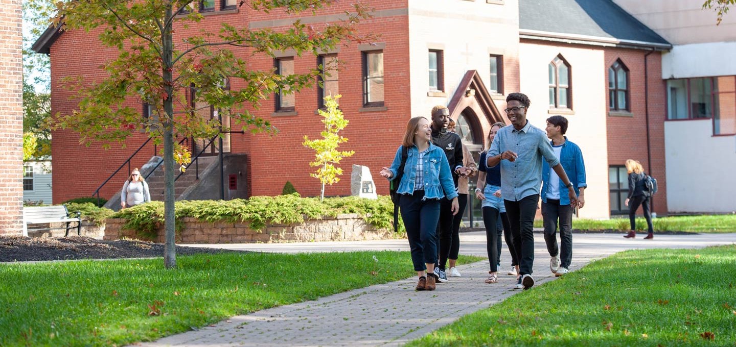 students walking through the quad