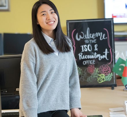 a student employee works in the international relations office