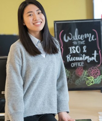 a student employee works in the international relations office