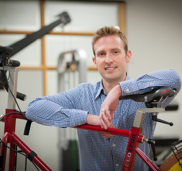 student and stationary bike