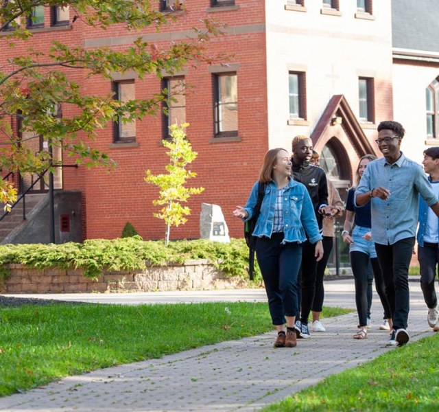 students walking through the quad