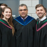 BSc in Paramedicine graduates Damia Scott, left, and Mike Hannah, right, are pictured with Dr. Trevor Jain, program director.